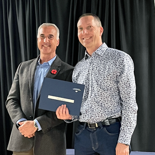 Provost's Awards for Scholarship, Research and Creative Activity SRCA Service Award Recipient Dr. Eric Demers